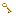 Retro Diffusion 16 by 16 brass key for the same prompt: mixed pixel sizes, dozens of shades and a soft rim
